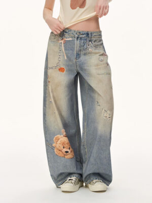 Mud-Wash Distressed Denim Jeans with Bear Print